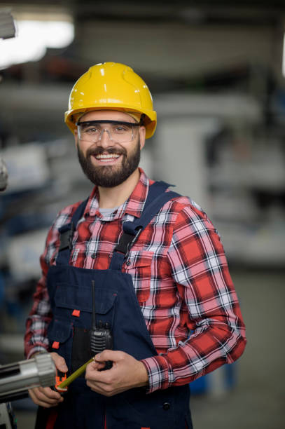 istock Young factory worker stock photo 1307573115