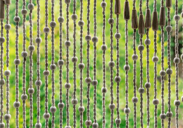 istock Wooden hanging curtain 1307573316