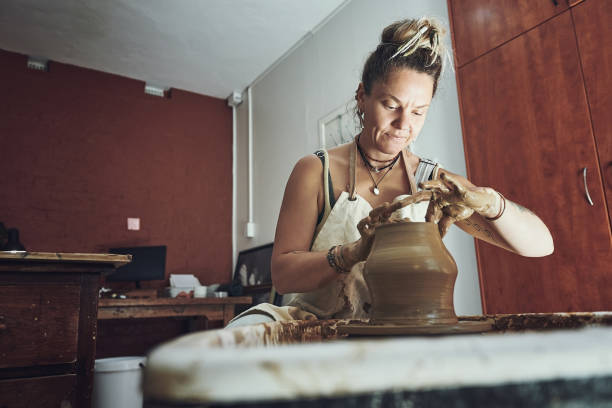 istock Working with clay is seriously messy business 1307574630