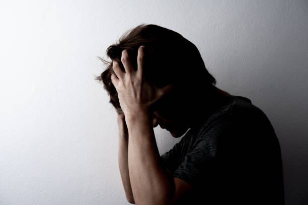 istock Man sad worry on white background serious unhappy 1307574740