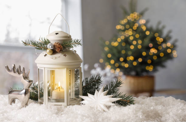 istock Composition with Christmas lantern on table in decorated room, space for text 1307574772