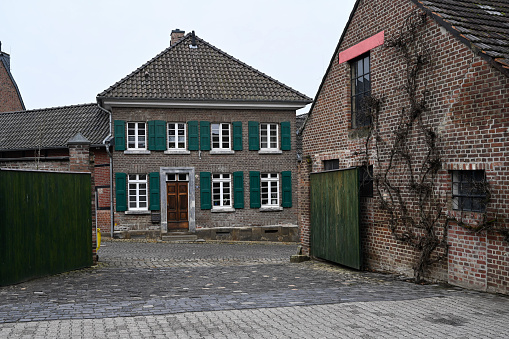 Korschenbroich , Germany, March 10, 2021 - Old brick houses in the Liedberg district of Korschenbroich