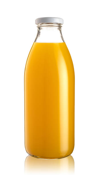 istock Front view of orange juice glass bottle isolated on white 1307575968