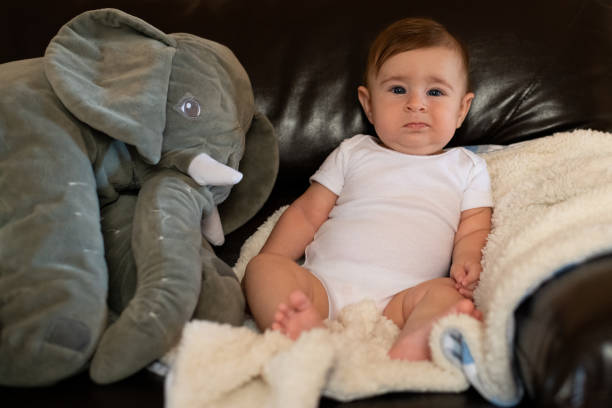 istock Portrait of upset baby. 1307576403