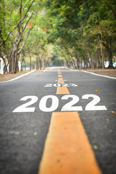 istock New year 2022 to 2024 on asphalt road surface 1307579815
