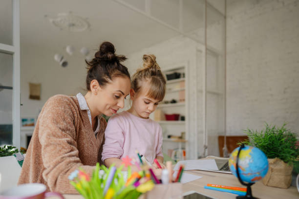 istock Mom is my new teacher 1307580566