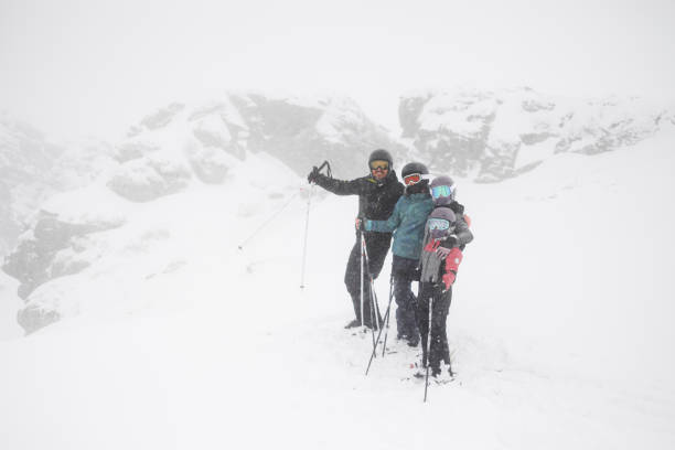 istock Family skiing 1307581198