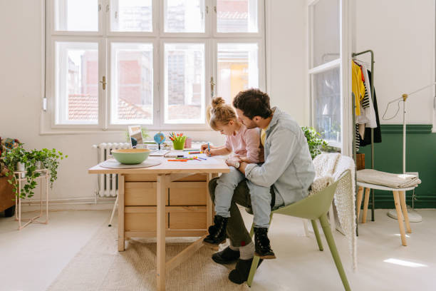 istock Dad is my new teacher 1307581261