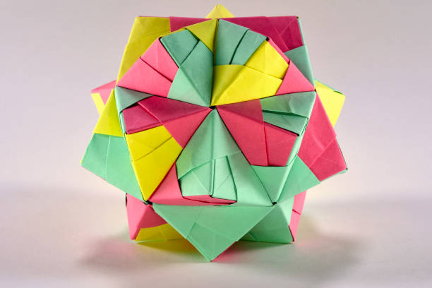 istock Self-made colorful origami star cube on white background. 1307581296