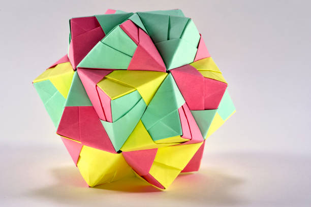istock Self-made colorful origami star cube on white background. 1307581298
