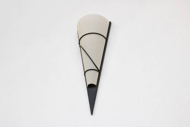 Wall lamp by the window in room