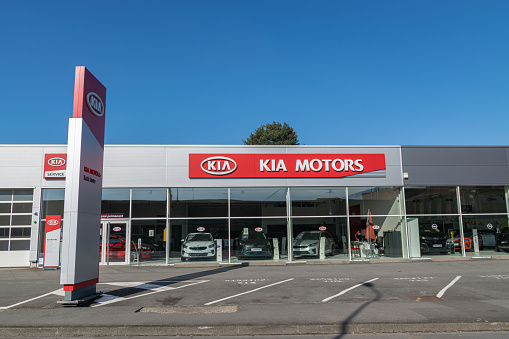 Villeneuve d'Ascq,FRANCE-February 28,2021: View of the KIA brand dealership store.KIA Motors is a South Korean automotive company producing passenger cars, vans and buses belonging to the Hyundai.