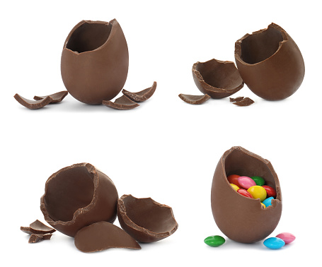 Set with broken chocolate eggs on white background