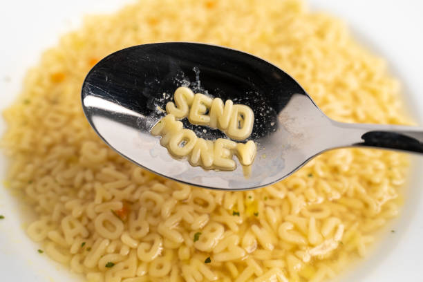 istock Alphabet Soup Letters Send Money 1307591637