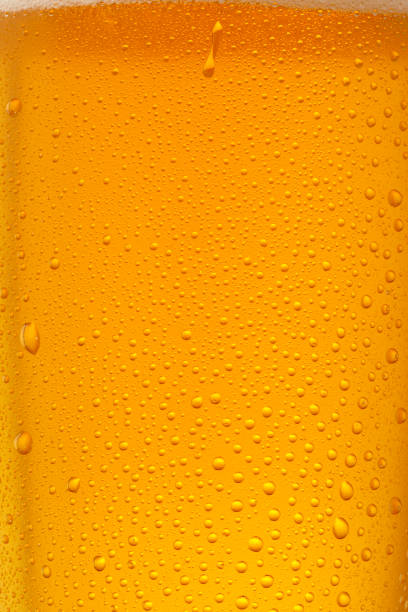 istock Beer Background. Ice Cold Beer Glass With Water Drops Condensation 1307593253