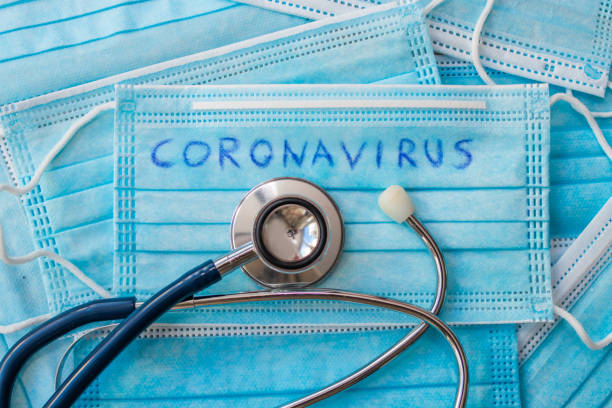 istock coronavirus protection mask and stethoscope 1307603886