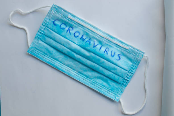 istock sanitary mask isolated on background 1307603963
