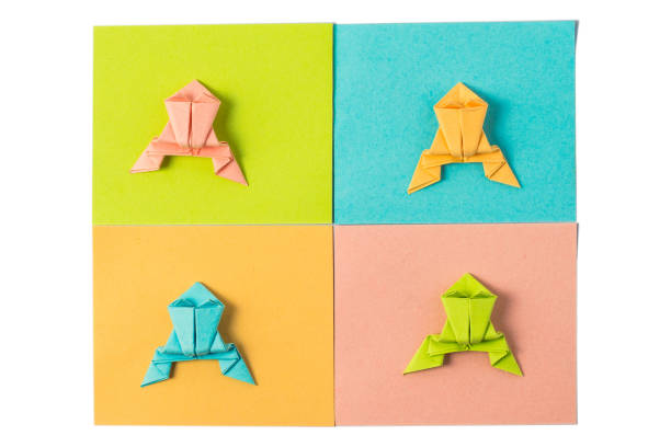 colored paper frogs on colored stickers