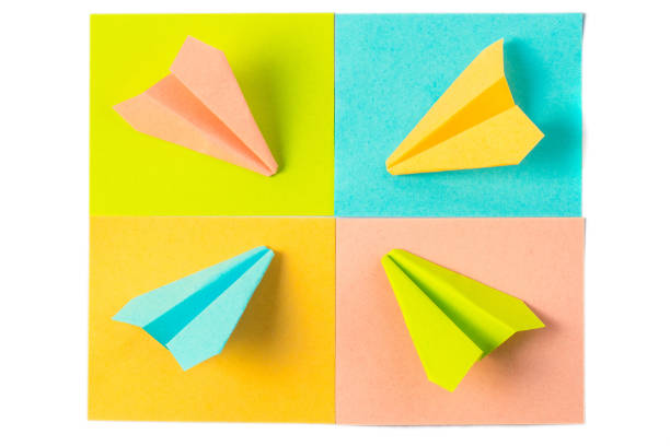 istock colored stickers and paper airplanes 1307604151