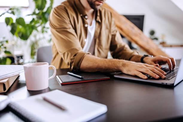 istock Entrepreneur working on laptop online 1307605113