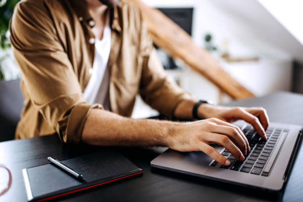 Entrepreneur working on laptop online