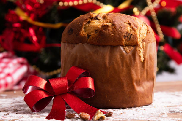istock christmas panettone with red bow and ornaments 1307605640