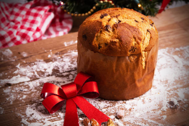 istock christmas panettone with red bow and ornaments 1307605849