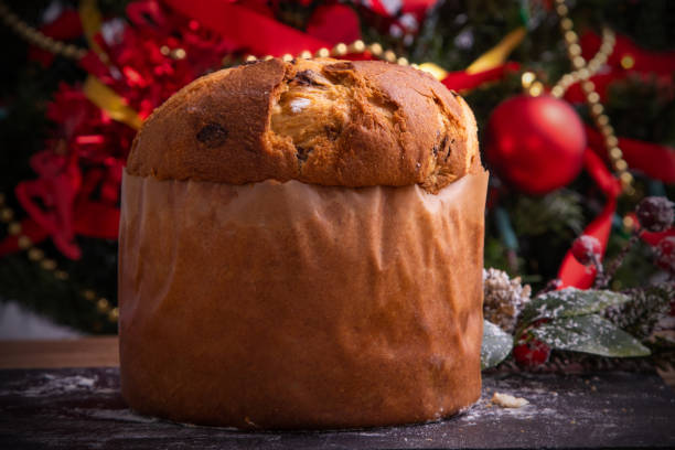 istock wooden panettone with christmas decorations 1307606605