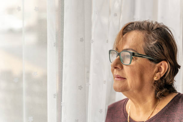 istock Senior Hispanic woman headshot 1307608033