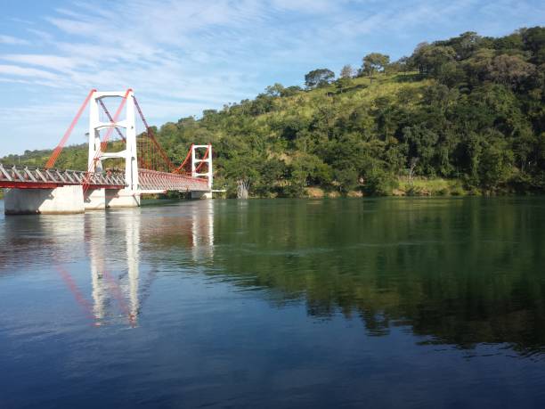 Suspension Bridge Alves de Lima The Alves Lima bridge, which allows the connection between Ribeirão Claro (PR), and Chavantes (SP) is one of the three suspension bridges built in Brazil. neemias stock pictures, royalty-free photos & images