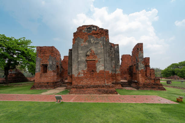 istock old ruins temple in green grass field 1307616494