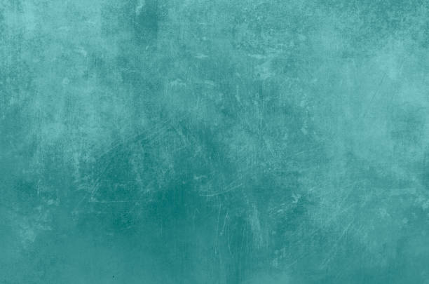 istock Turquoise color grungy background 1307616824