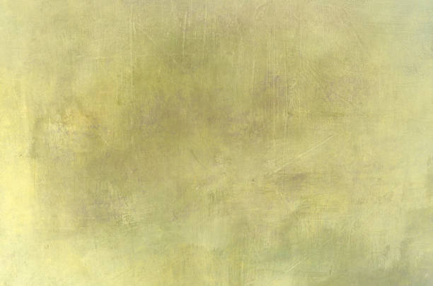 istock Greenish yellow wall background 1307616835