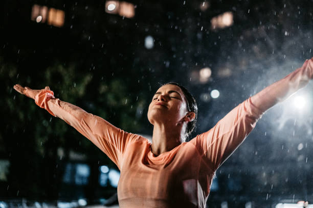 istock Enjoying in the summer rain 1307620362