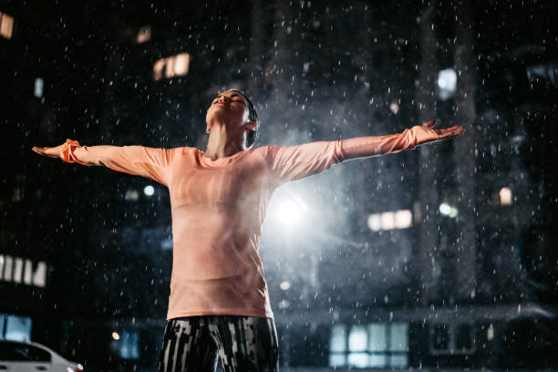 istock Enjoying in the summer rain 1307620447