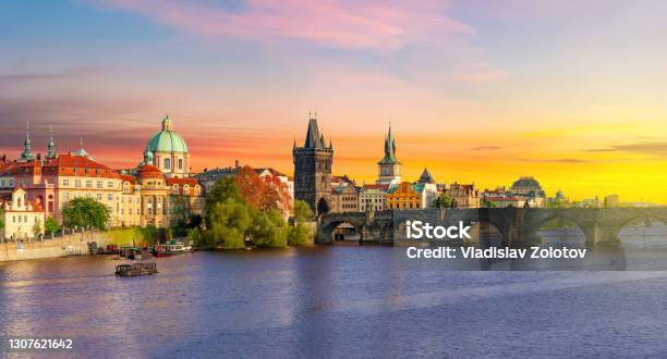 Classic Prague Panorama With Old Town Bridge Tower And Charles Bridge Over Vltava River At Sunset Czech Republic Stock Photo - Download Image Now