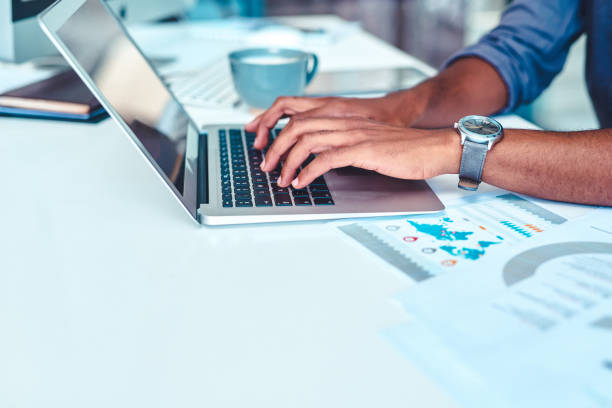istock Sending and receiving all the files he needs 1307621811