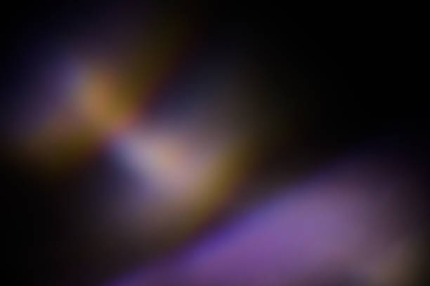 istock colorful warm rainbow light leaks on black background with dust texture 1307623116