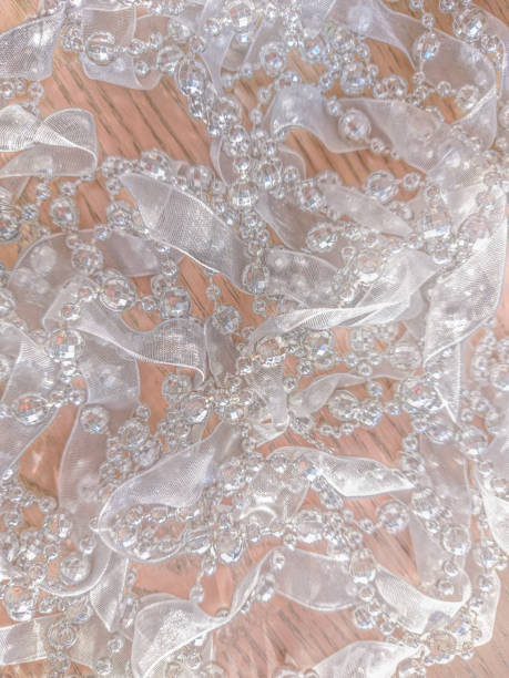 istock White abstract background from the texture of silk ribbon 1307624657