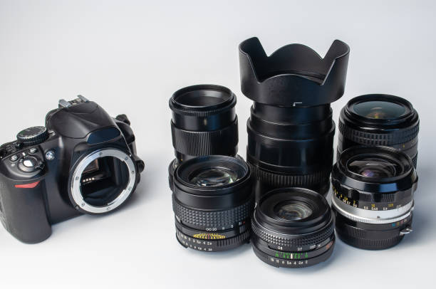 istock Camera and set of photo lens on white background 1307624732