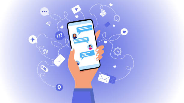 istock Vector editable graphics. Vivid concept of online conversation. A hand holds a phone with an open chat. Screenshot. Communication, talking on the phone, conference. Icons for messages, notifications, 1307627402