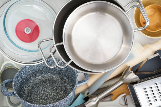 istock Open drawer with different utensils in kitchen, flat lay. Close-up 1307632481