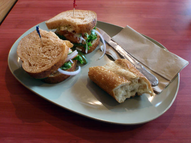 istock Mediterranean Veggie Sandwich with side of bread 1307633215