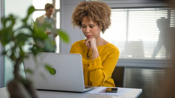 istock Businesswoman using laptop in office 1307636414
