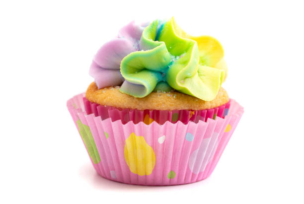 istock Pastel Rainbow Frosted Easter Cupcakes  Isolated on a White Background 1307637253