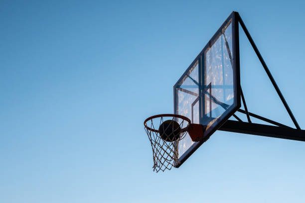 istock A basketball in a hoop 1307641042