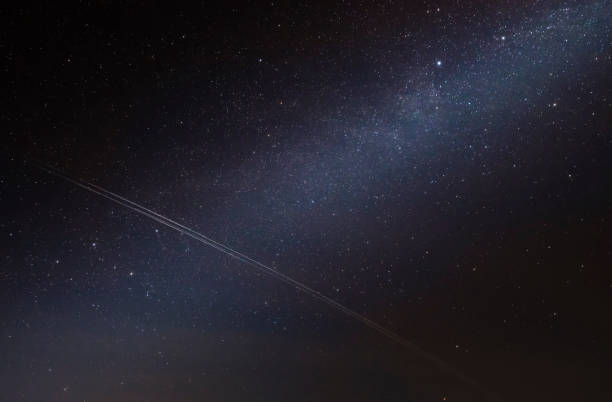 istock Multicolored stars in the night sky. The Milky Way. 1307641700