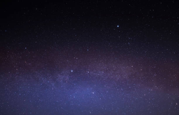 istock Multicolored stars in the night sky. The Milky Way. 1307641701