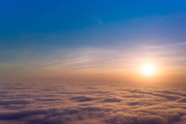 istock Dawn or sunset over the clouds, blue hour, aerial view. 1307642594