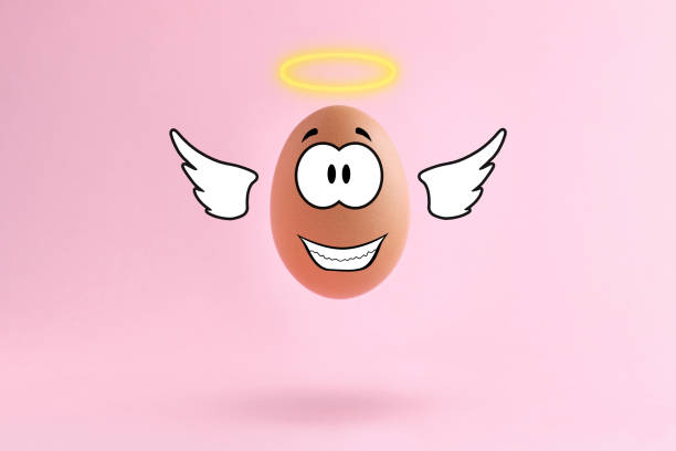 istock Abstract image of a smiley angel on egg levitating in the air. Happy easter concept. 1307643306